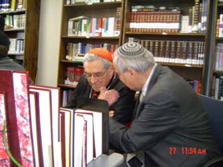 Cardinal Lustiger being taught by a rabbi